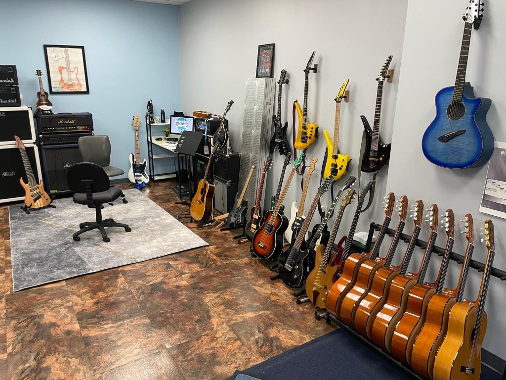 guitar teacher music school mirror tuning private lessons norfolk county 